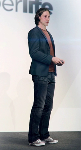 Portrait of Kamski at a business presentation